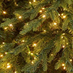 Albero Deluxe in finto pino 195 cm, 2950 miniled integrati bianco caldo