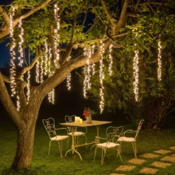 Cascata di luci Connect+ 3 nastri, 300 led bianco caldo, cavo verde, prolungabile
