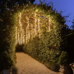 Cascata di luci Connect+ 3 nastri, 300 led bianco caldo, cavo verde, prolungabile
