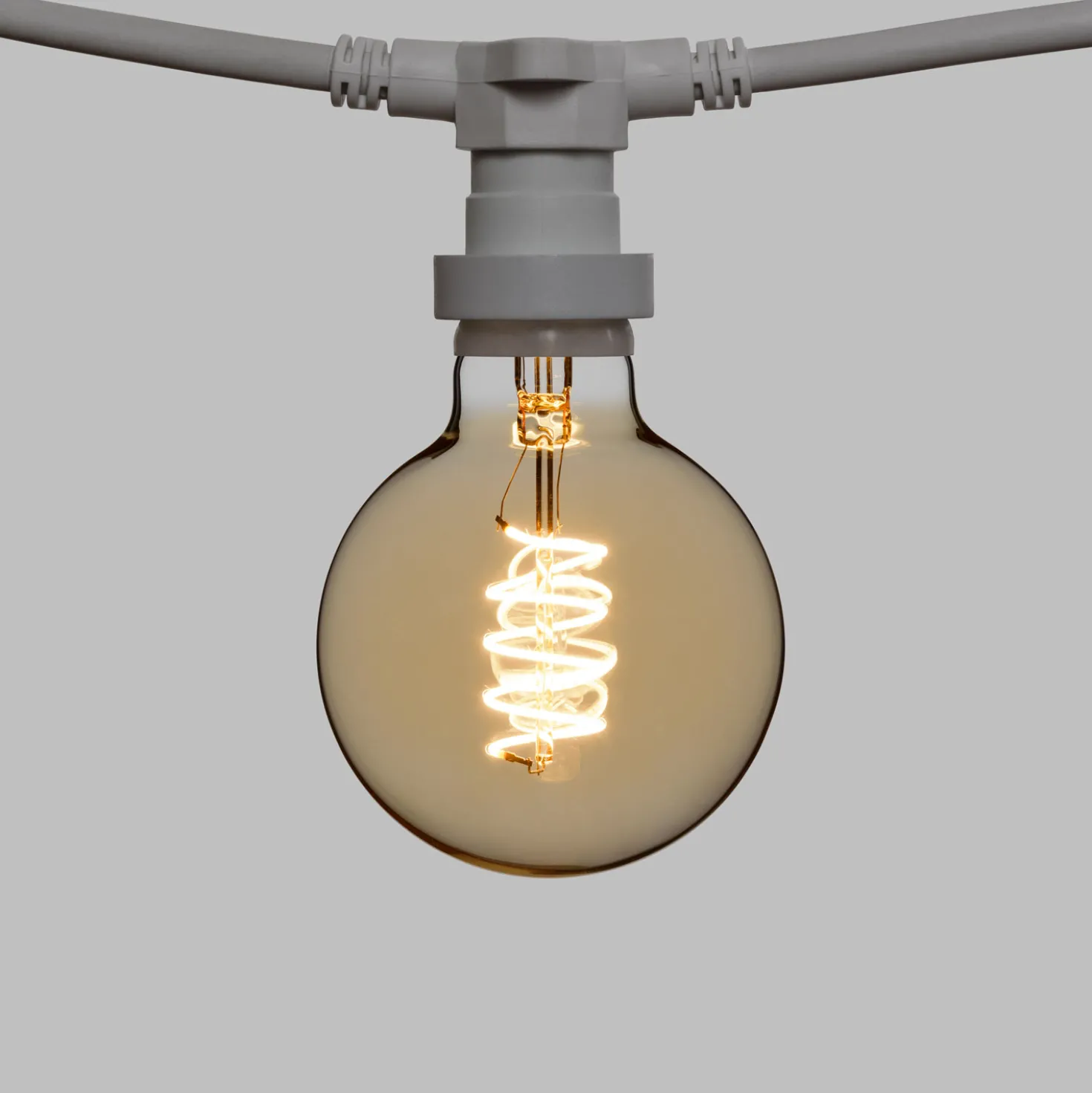 Catena 5 m, 8 lampadine globo Ø 95 mm di 4 Watt, led a spirale, cavo bianco, prolungabile