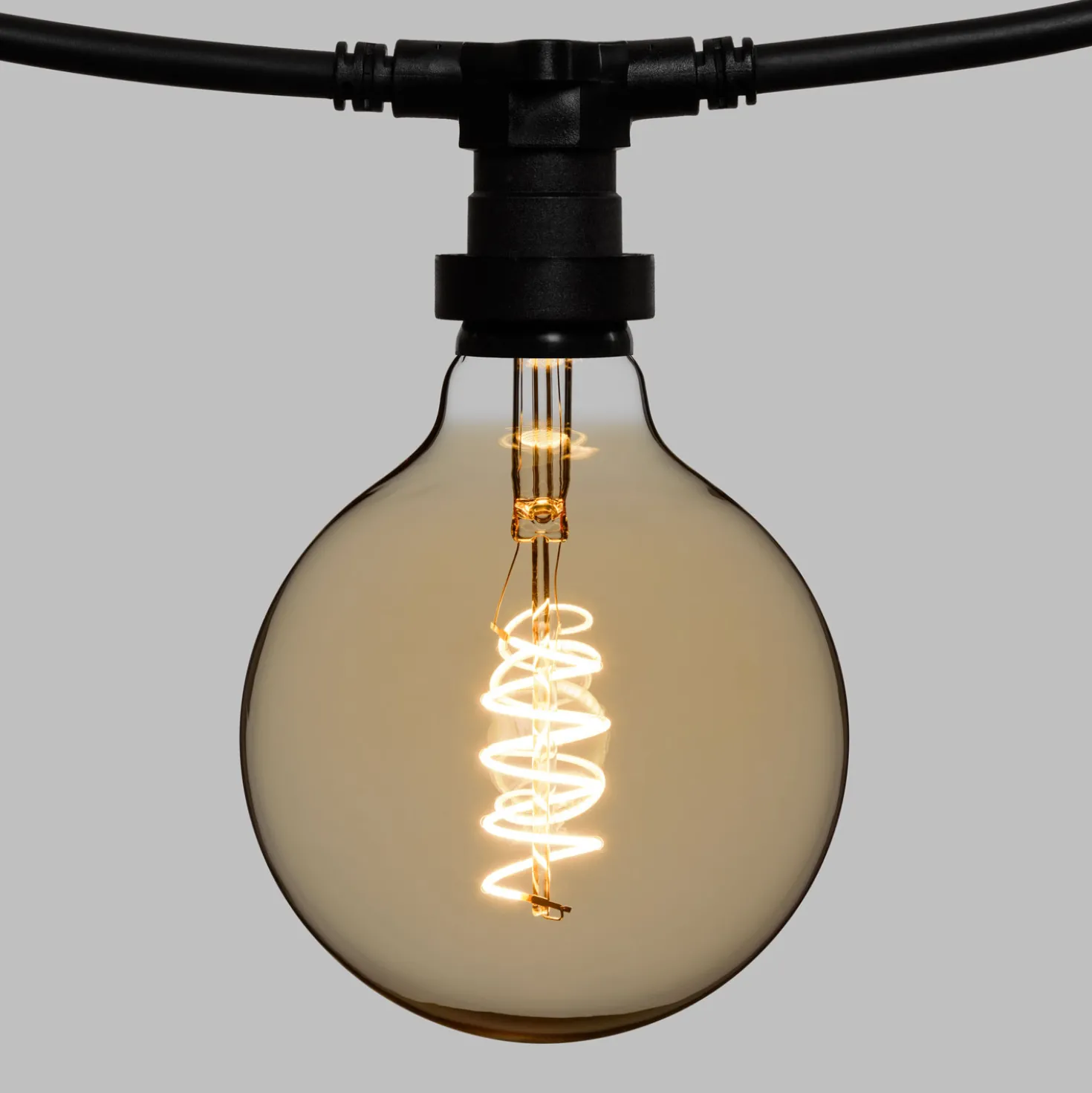 Catena 5 m, 5 lampadine globo Ø 125 mm di 4 Watt led, led a spirale, cavo nero, prolungabile