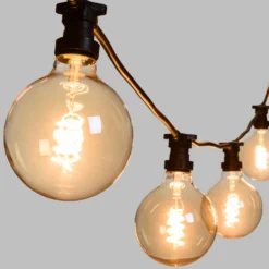 Catena 5 m, 5 lampadine globo Ø 125 mm di 4 Watt led, led a spirale, cavo nero, prolungabile