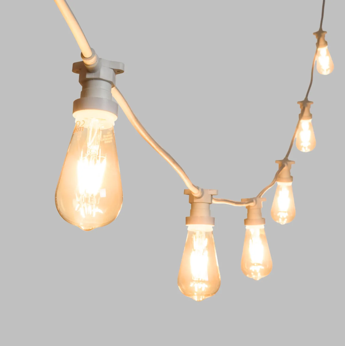 Catena 5 m, 8 lampadine led Edison Ø 64 mm di 4 Watt, cavo bianco, prolungabile