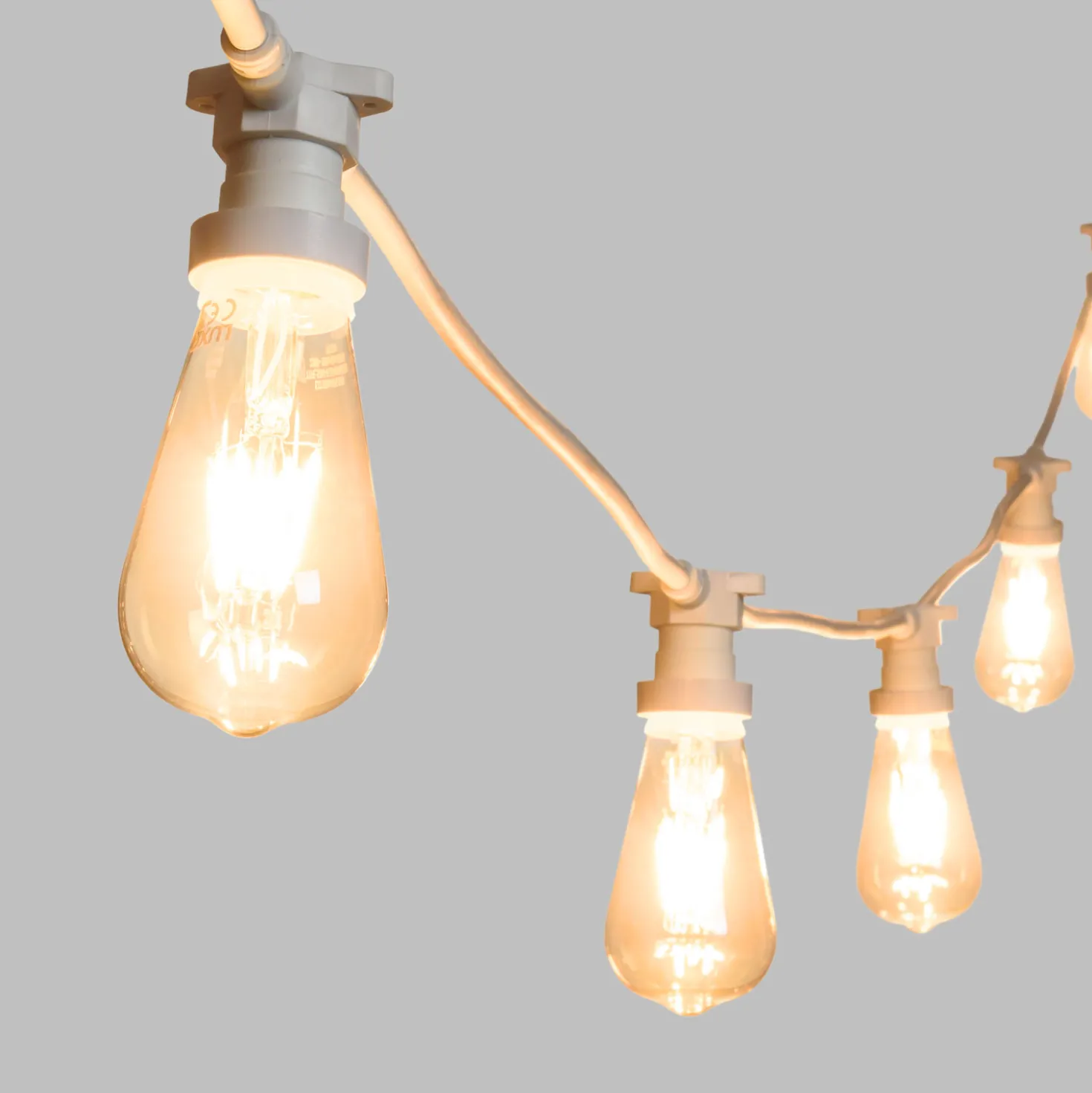 Catena 5 m, 5 lampadine led Edison Ø 64 mm di 4 watt dimmerabili, cavo bianco, prolungabile