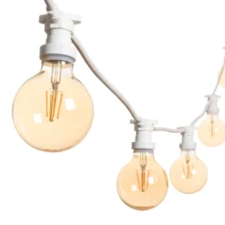 Catena 5 m, 5 lampadine led globo Ø 95 mm di 4 watt, dimmerabili, cavo bianco, prolungabile