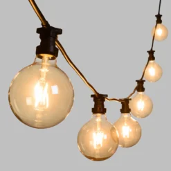 Catena 5 m, 8 lampadine led globo Ø 125 mm di 4 Watt, cavo nero, prolungabile