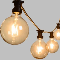 Catena 5 m, 5 lampadine led globo Ø 125 mm di 8 Watt, dimmerabili, cavo nero, prolungabile