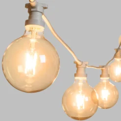 Catena 5 m, 5 lampadine led globo Ø 125 mm di 8 Watt, dimmerabili, cavo bianco, prolungabile