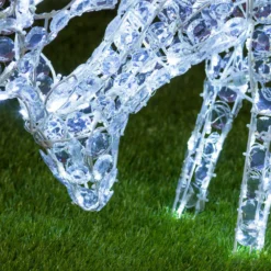 Renna che bruca l'erba, h. 50 cm, led bianco freddo