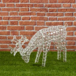 Renna che bruca l'erba, h. 50 cm, led bianco freddo