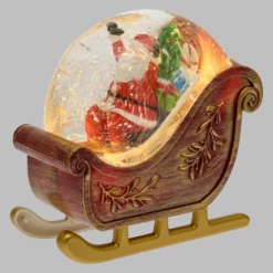 Slitta decorata con Babbo Natale a batteria con glitter nell'acqua