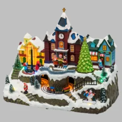 Villaggio Innevato con Chiesa e Trenino, Albero e Giostra per Bambini rotanti, h 27 cm, musiche natalizie
